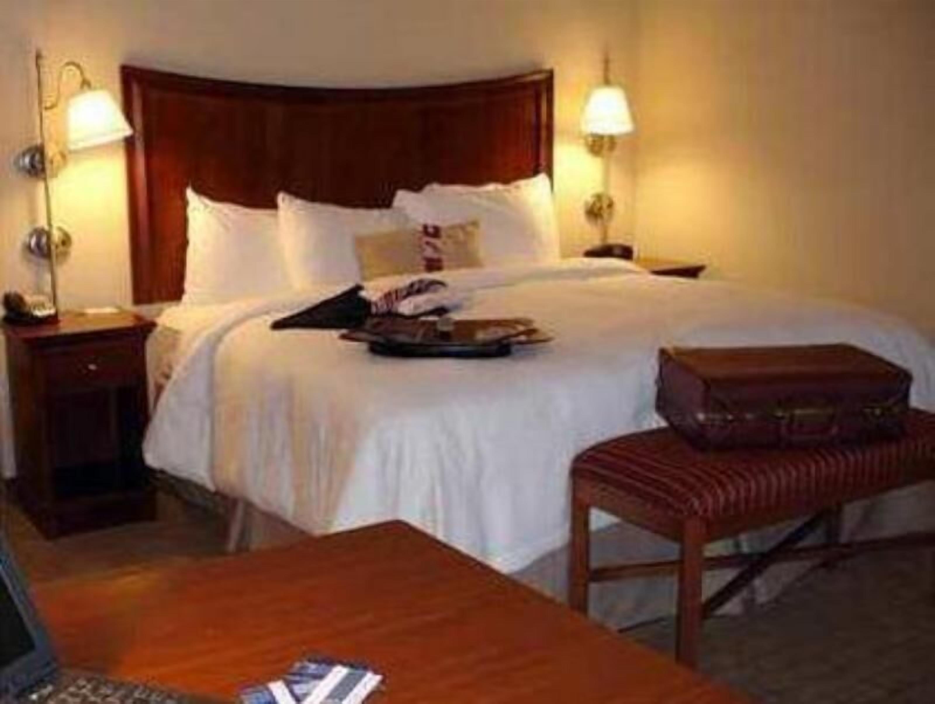 Premium bedding, down comforters, pillowtop beds, laptop workspace