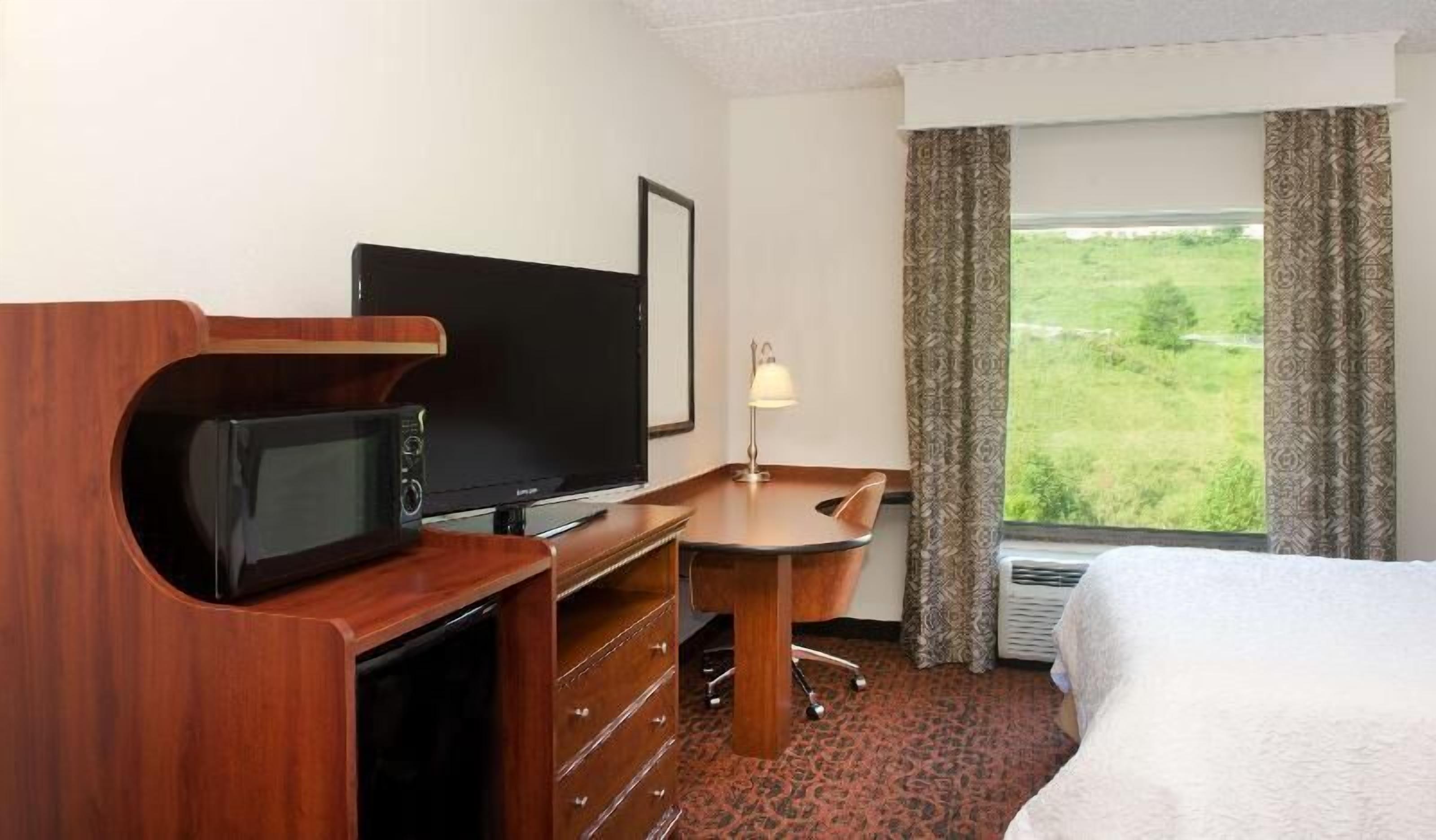 Premium bedding, down comforters, pillowtop beds, laptop workspace