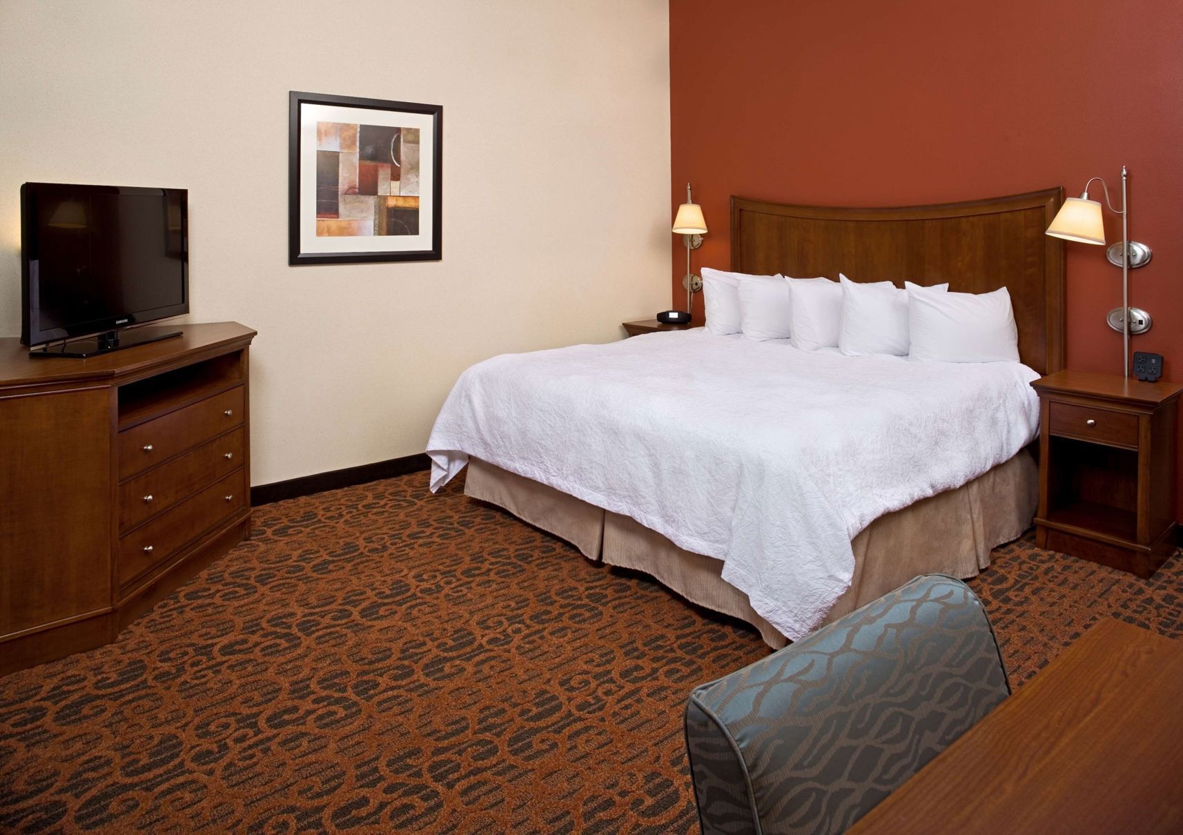 Premium bedding, down comforters, pillowtop beds, laptop workspace
