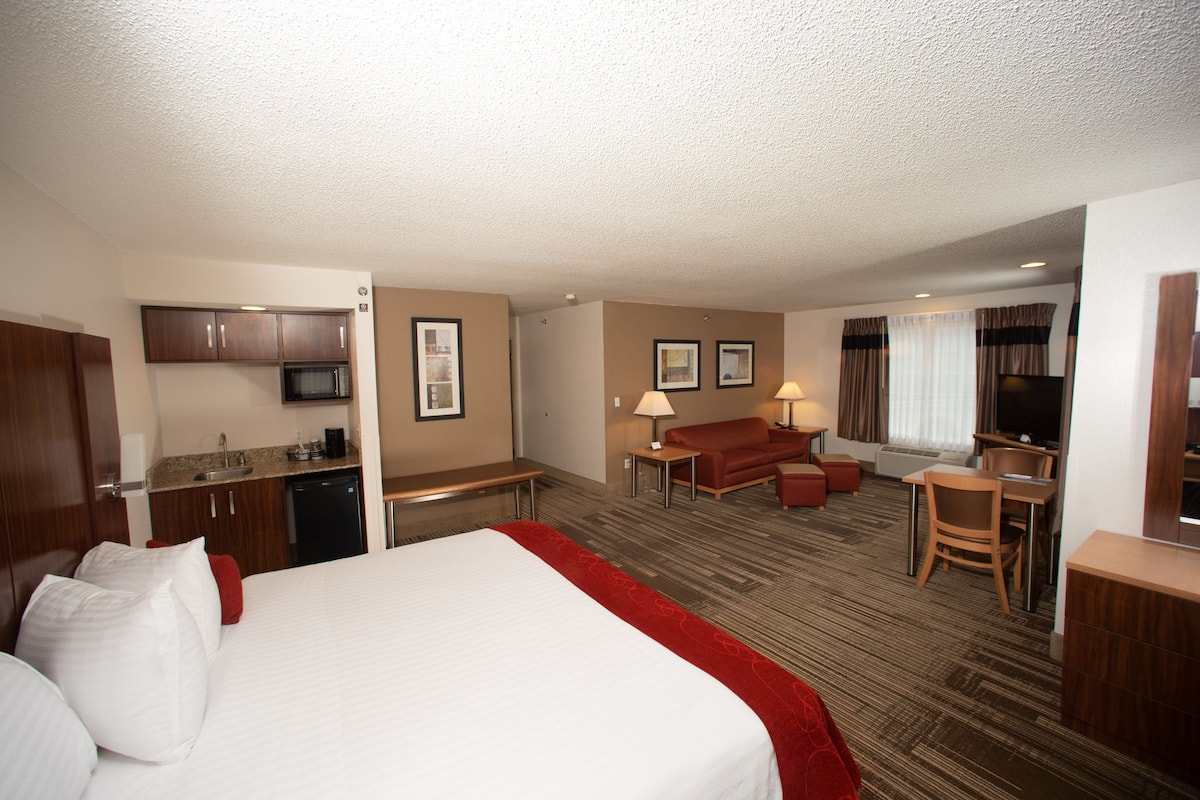 Deluxe Single Room | Premium bedding, pillow-top beds, desk, laptop workspace