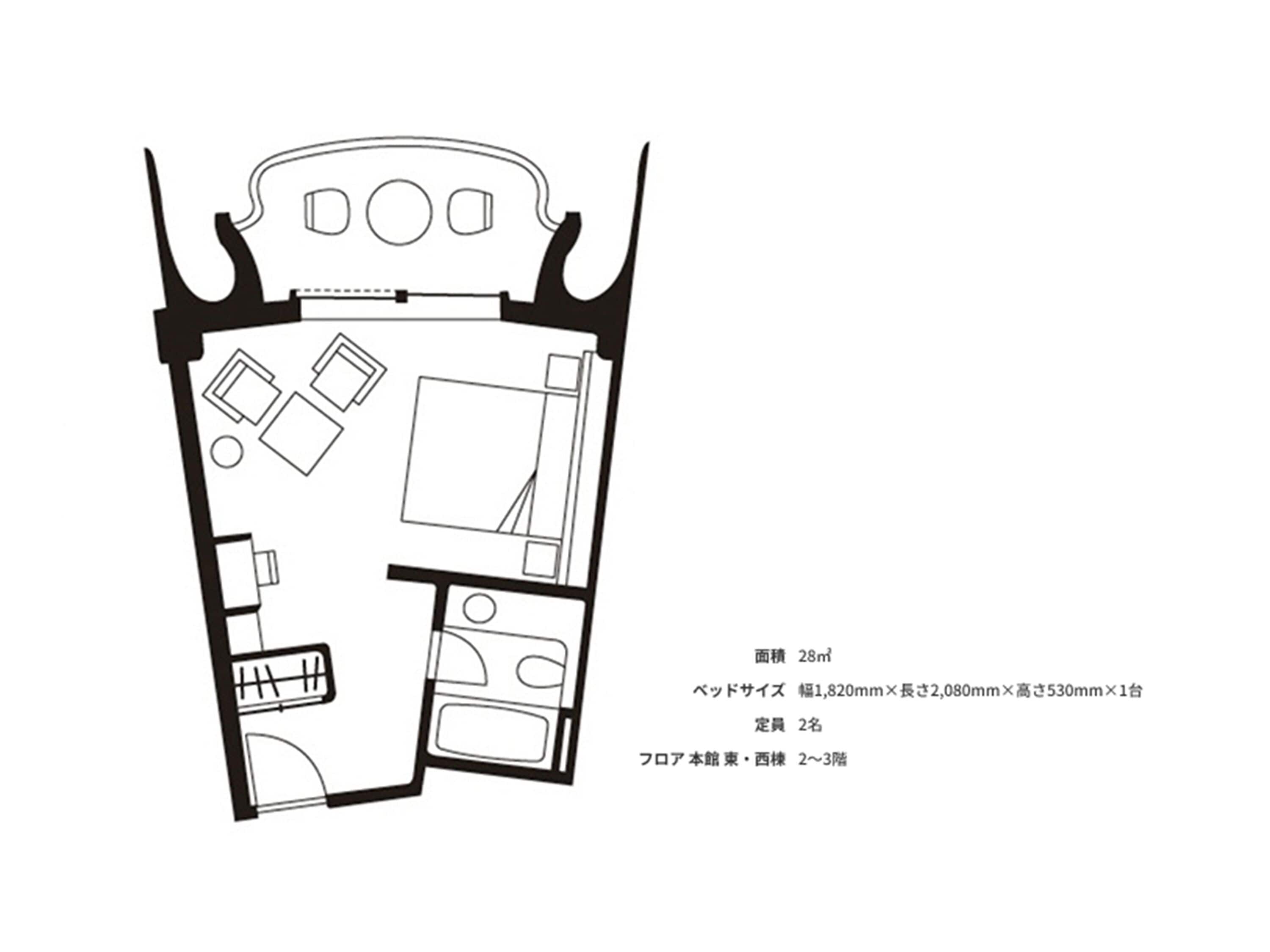 A floor plan of a hotel room with a bed, a desk, a chair, and a small table. The room has a window and a door.