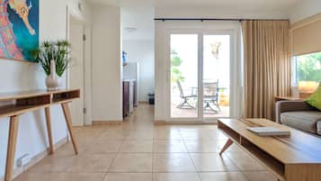 Suite, 1 King Bed with Sofa bed, Balcony, Sea View | 1 bedroom, in-room safe, individually decorated, iron/ironing board