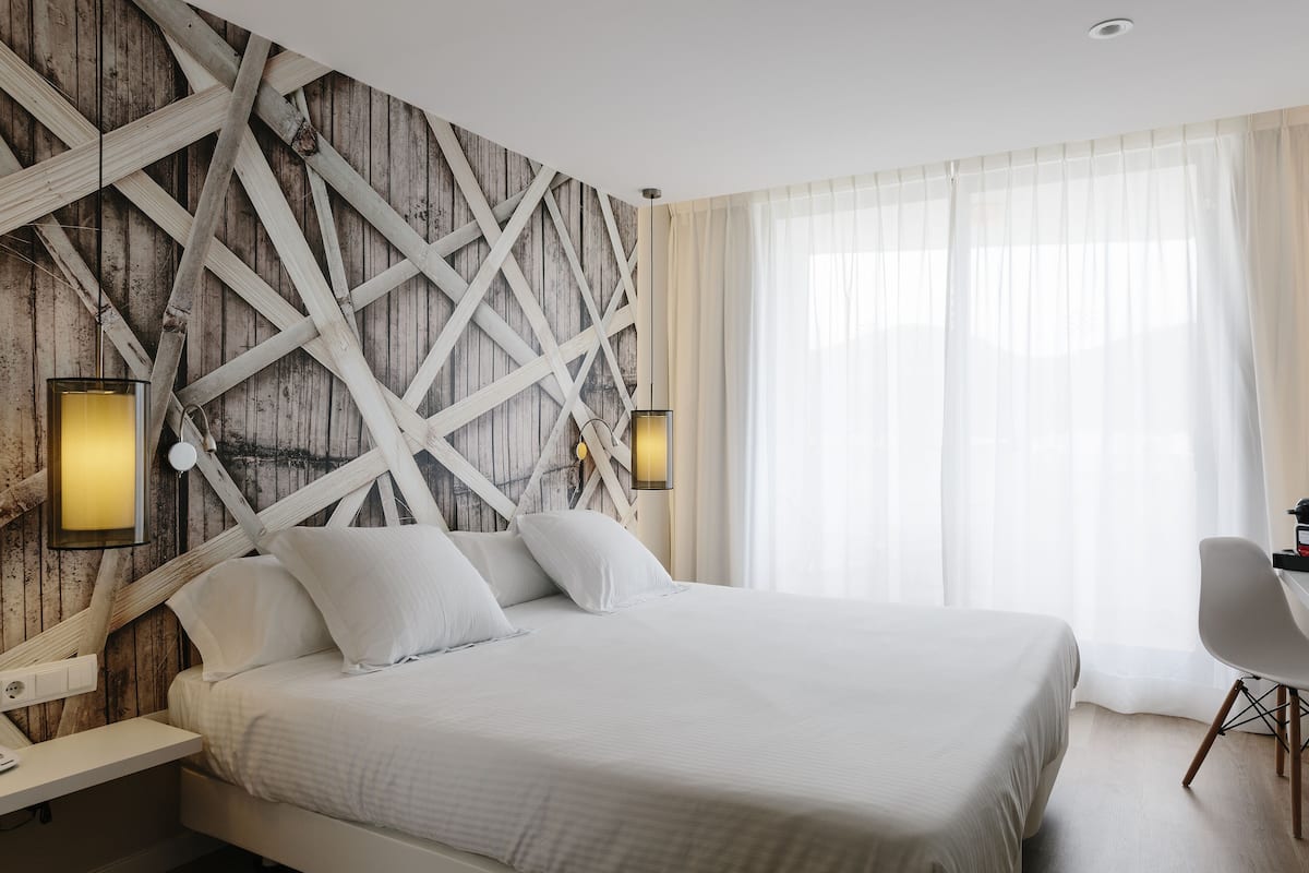 Premium bedding, memory foam beds, minibar, in-room safe