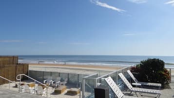 On the beach, beach cabanas