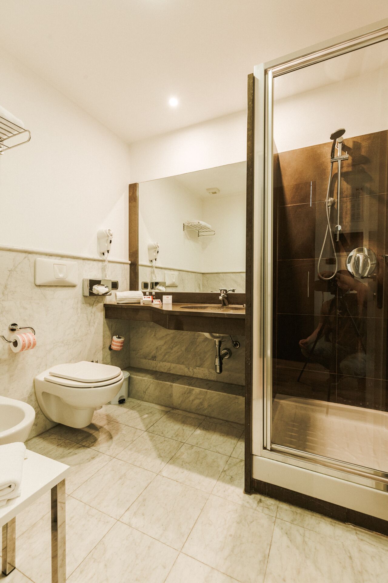 standard double room | bathroom | eco-friendly toiletries, hair dryer, slippers, bidet
