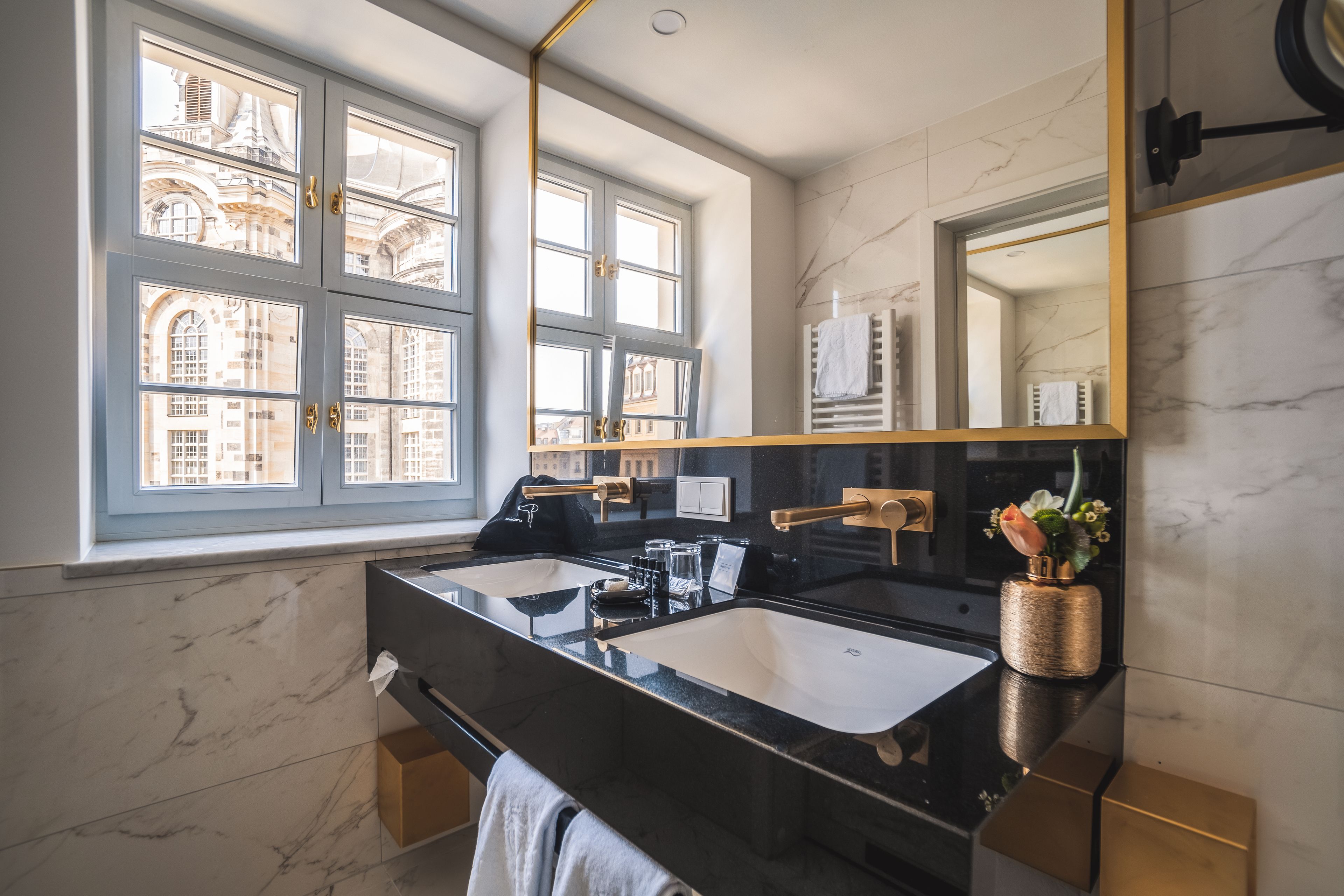 premium junior suite | bathroom | designer toiletries, hair dryer, bathrobes, slippers