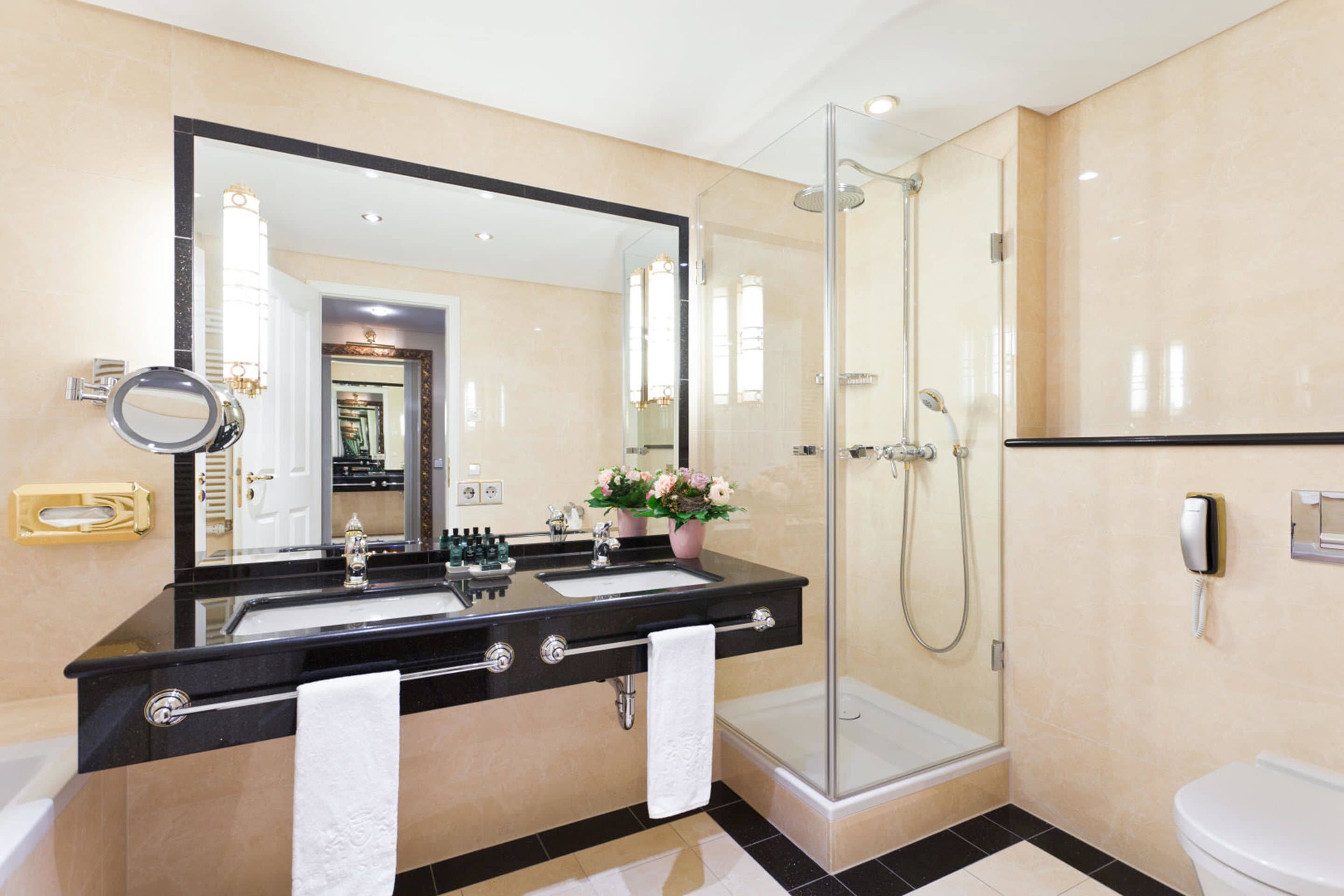 executive double room | bathroom | designer toiletries, hair dryer, bathrobes, slippers