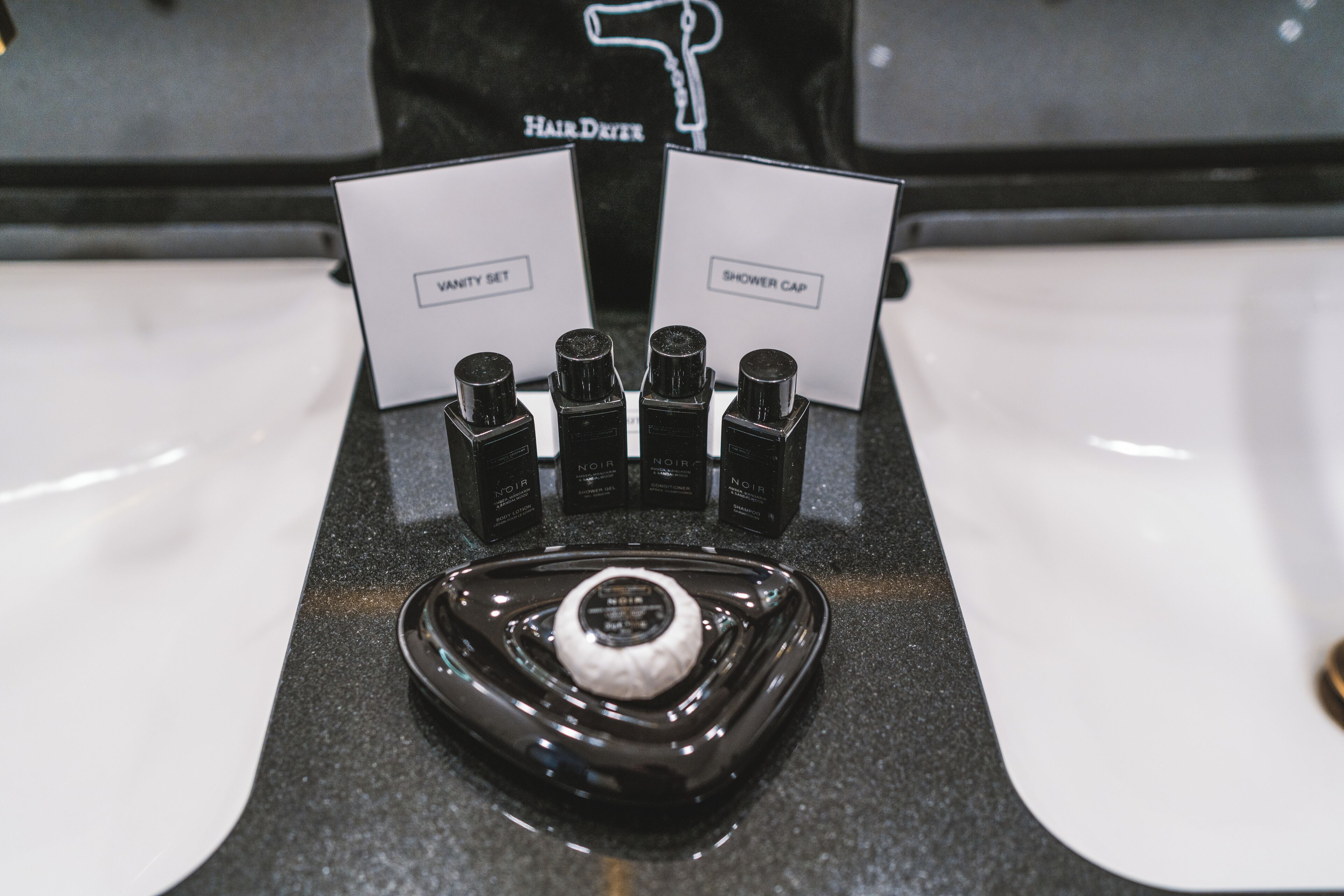 executive junior suite | bathroom | designer toiletries, hair dryer, bathrobes, slippers