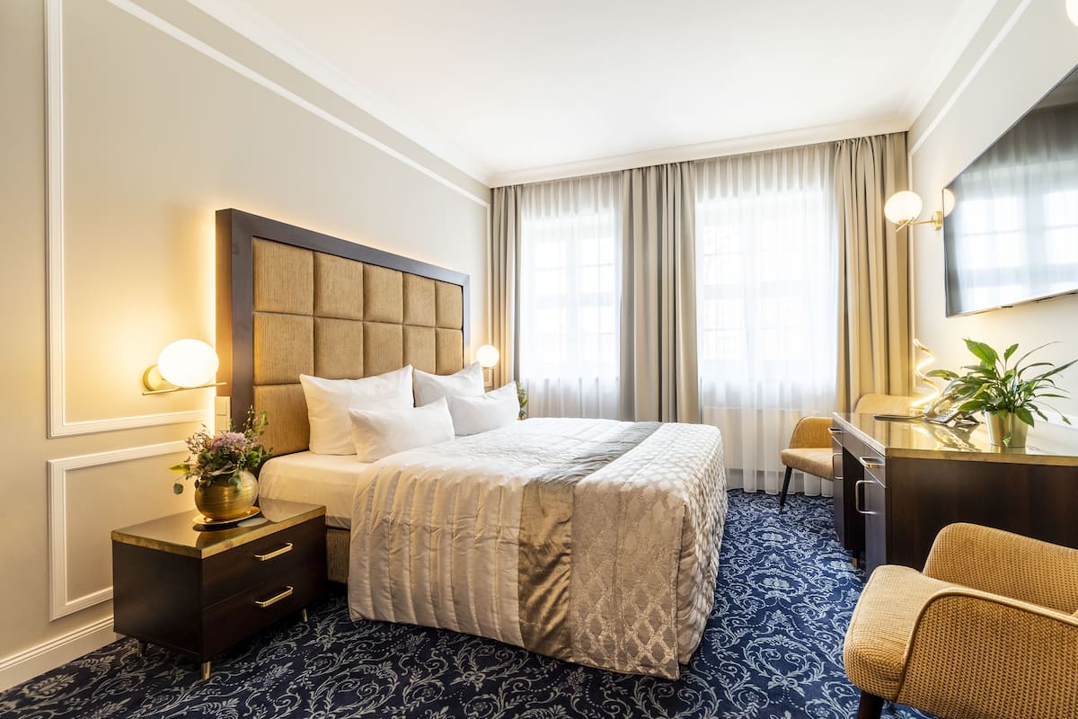 premium double room | living area | 50-inch flat-screen tv with cable channels, tv