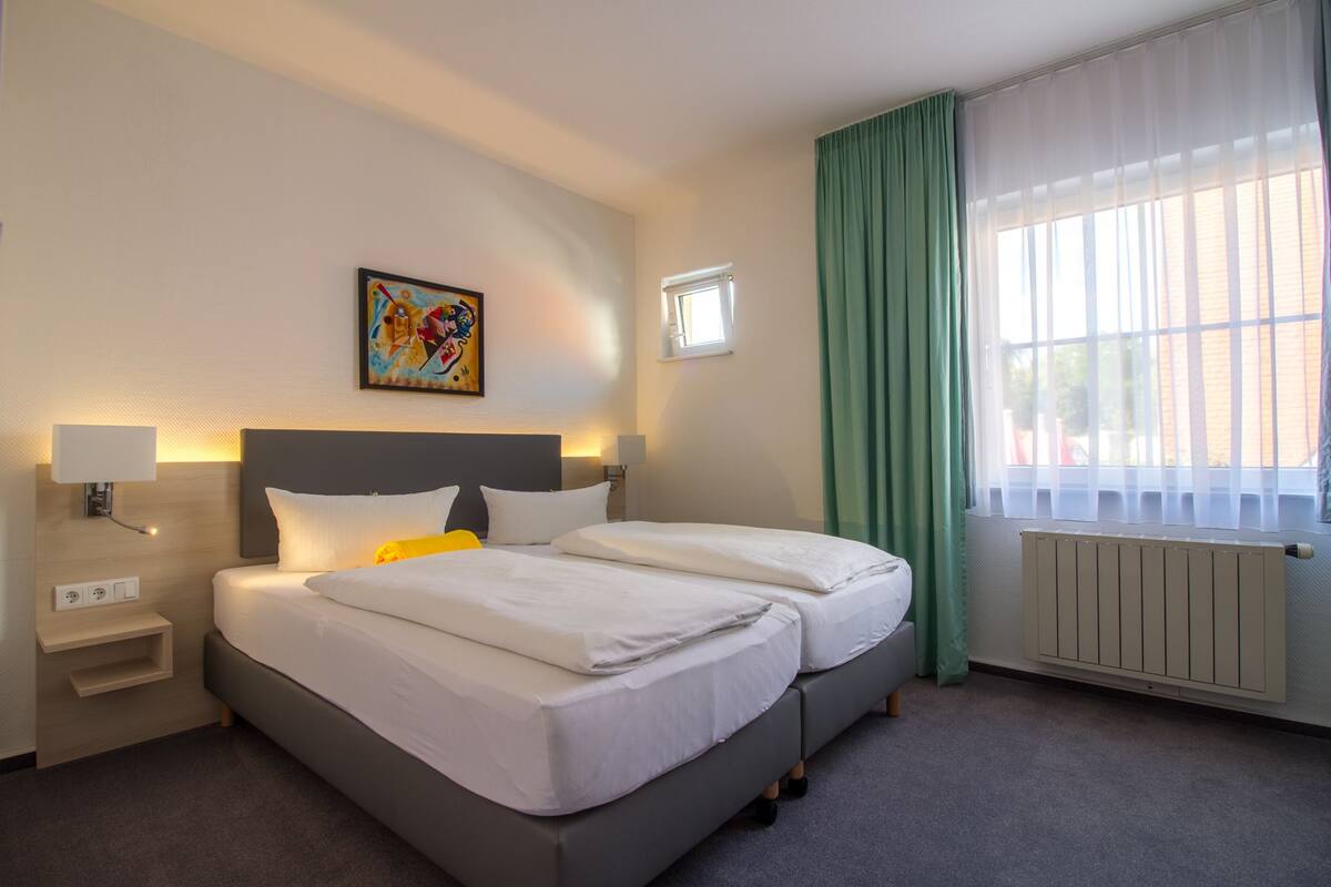 Desk, blackout drapes, cribs (surcharge), WiFi (free)