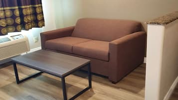 Room, 1 King Bed, Non Smoking | Pillowtop beds, in-room safe, blackout drapes, iron/ironing board