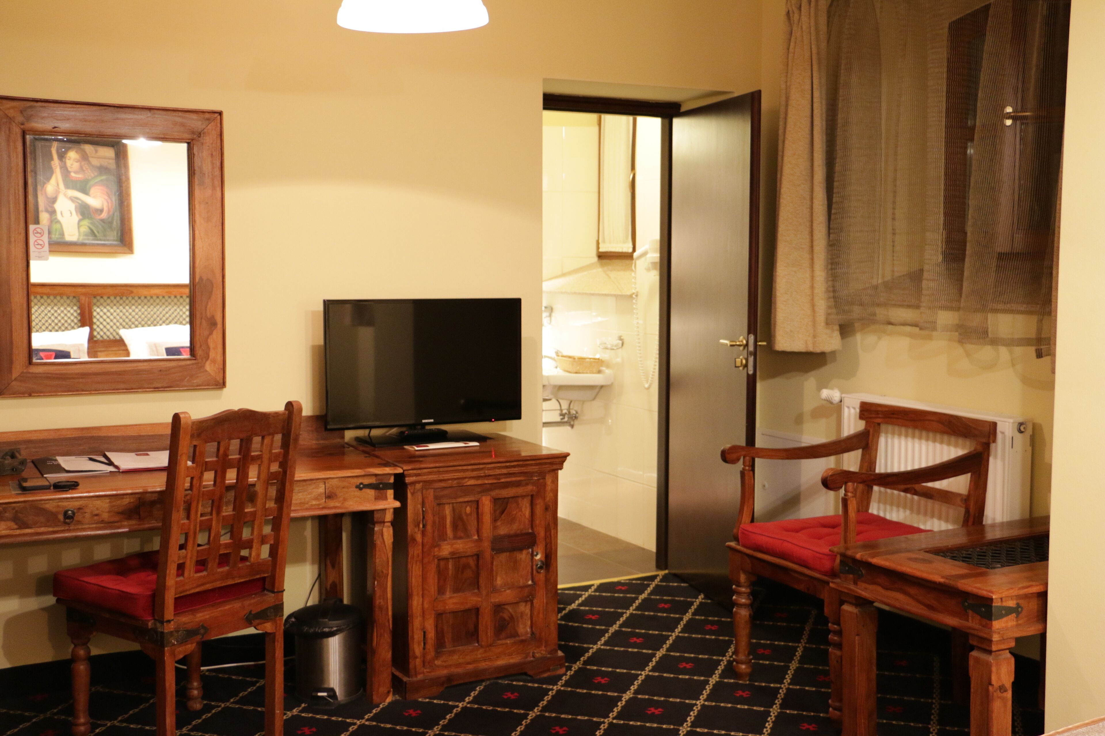 economy double room | 1 bedroom, premium bedding, minibar, in-room safe