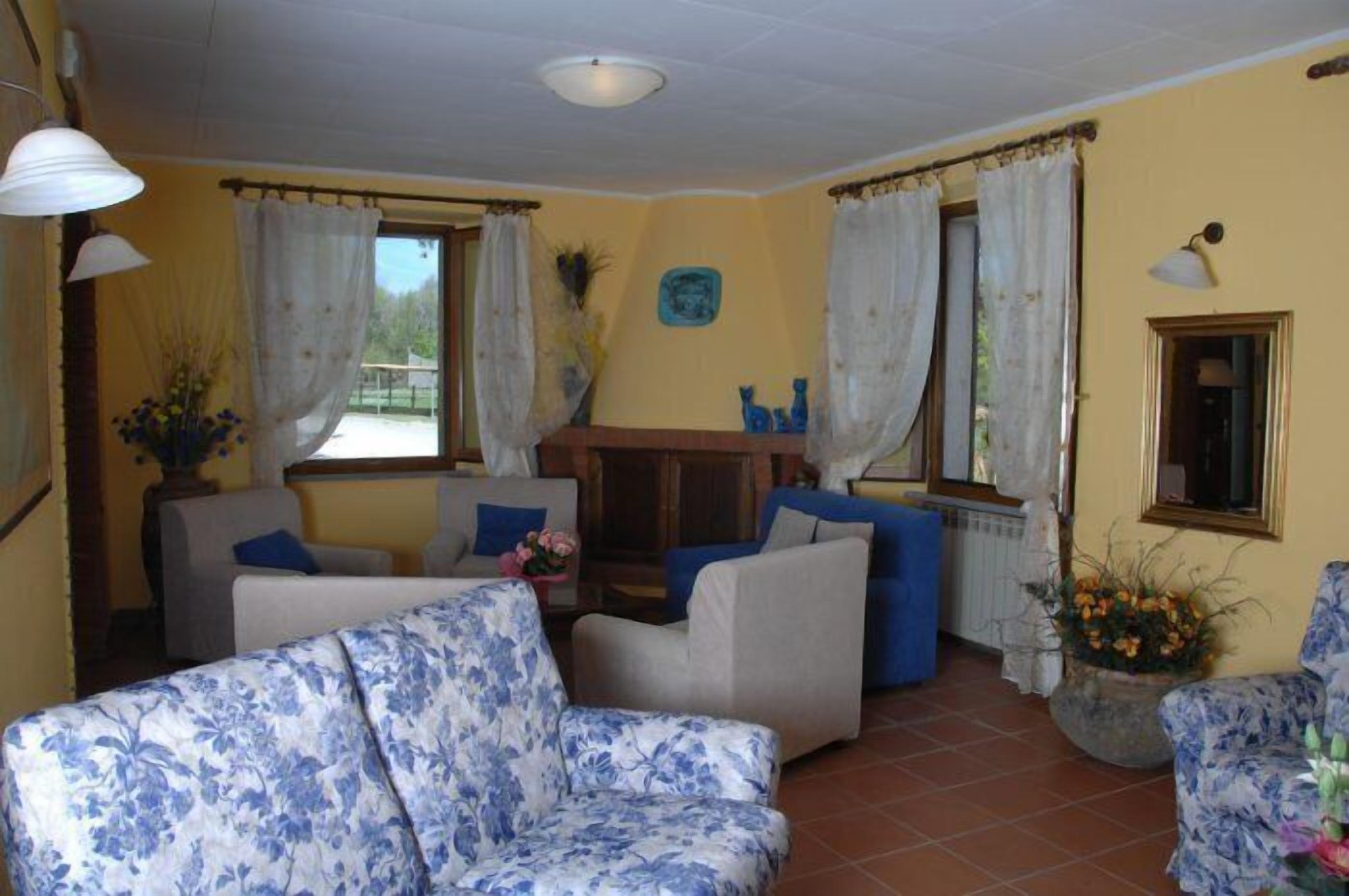 standard apartment, 2 bedrooms | living area | 23-inch smart tv with digital channels, tv