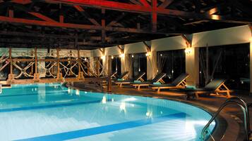 Indoor pool, outdoor pool, pool umbrellas, pool loungers