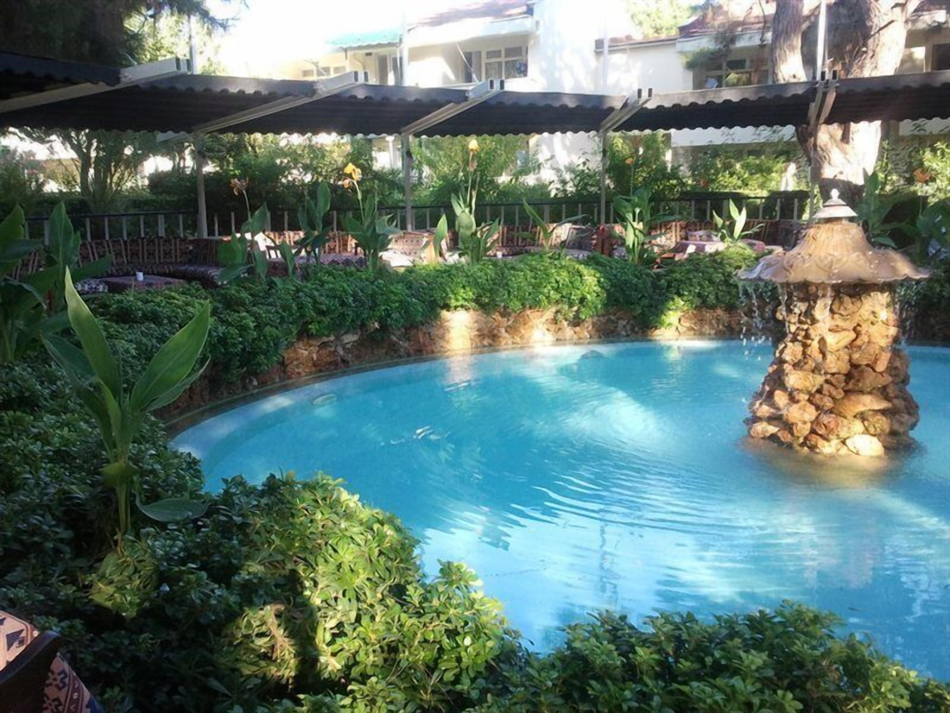 Indoor pool, outdoor pool, pool umbrellas, sun loungers