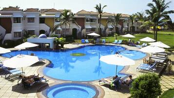 Outdoor pool, open 8:00 AM to 6:00 PM, pool umbrellas, pool loungers