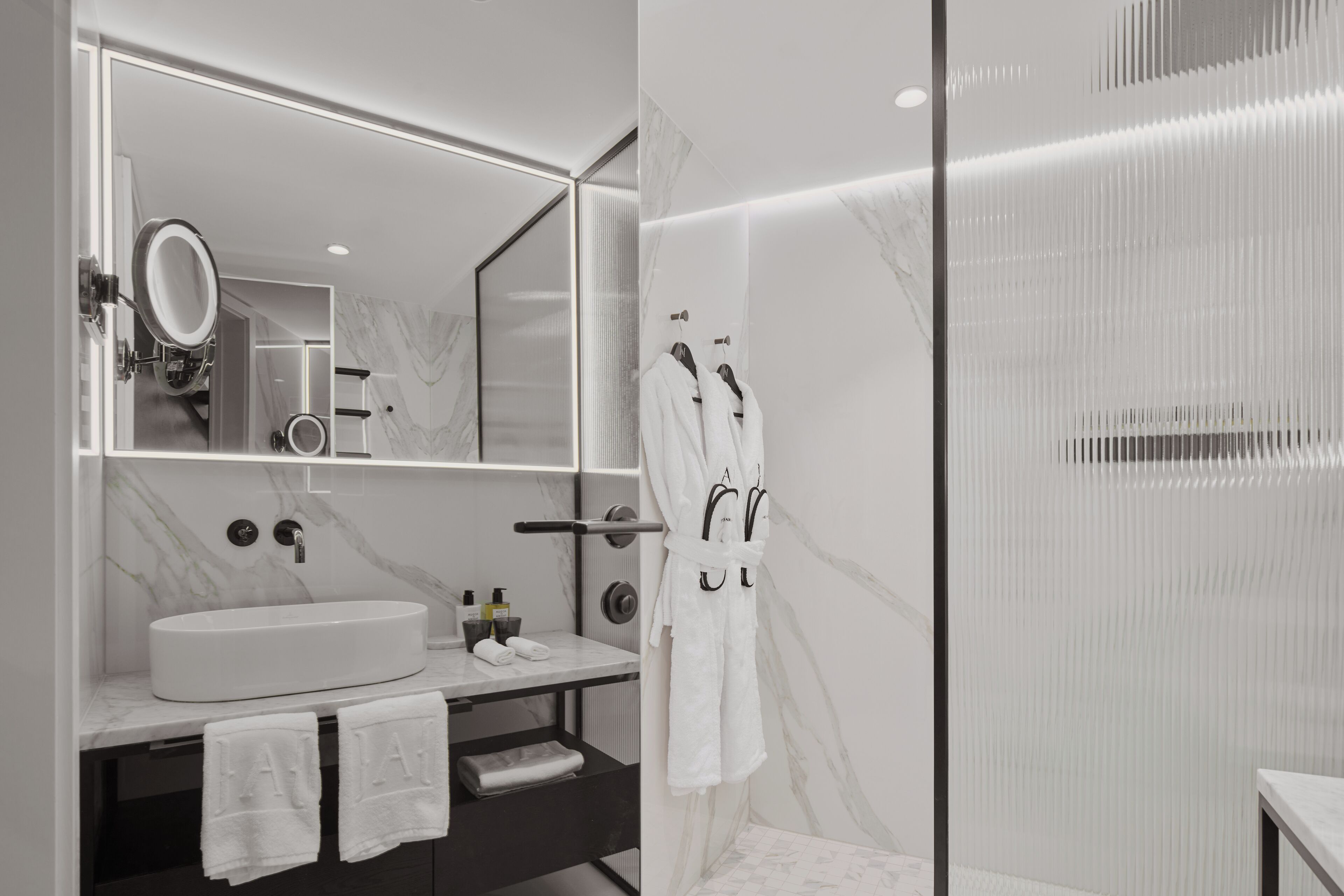 Gallery Suite | Bathroom | Designer toiletries, hair dryer, bathrobes, slippers