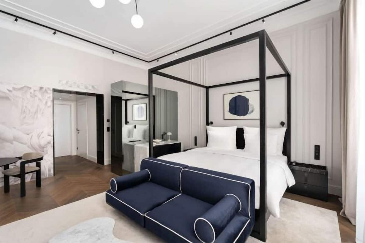 Premium bedding, down comforters, pillowtop beds, minibar