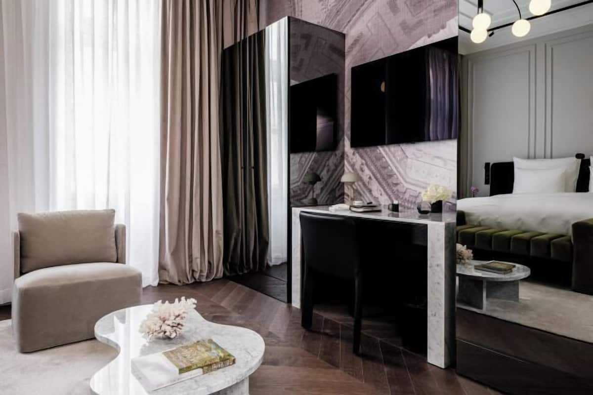 Premium bedding, down comforters, pillowtop beds, minibar