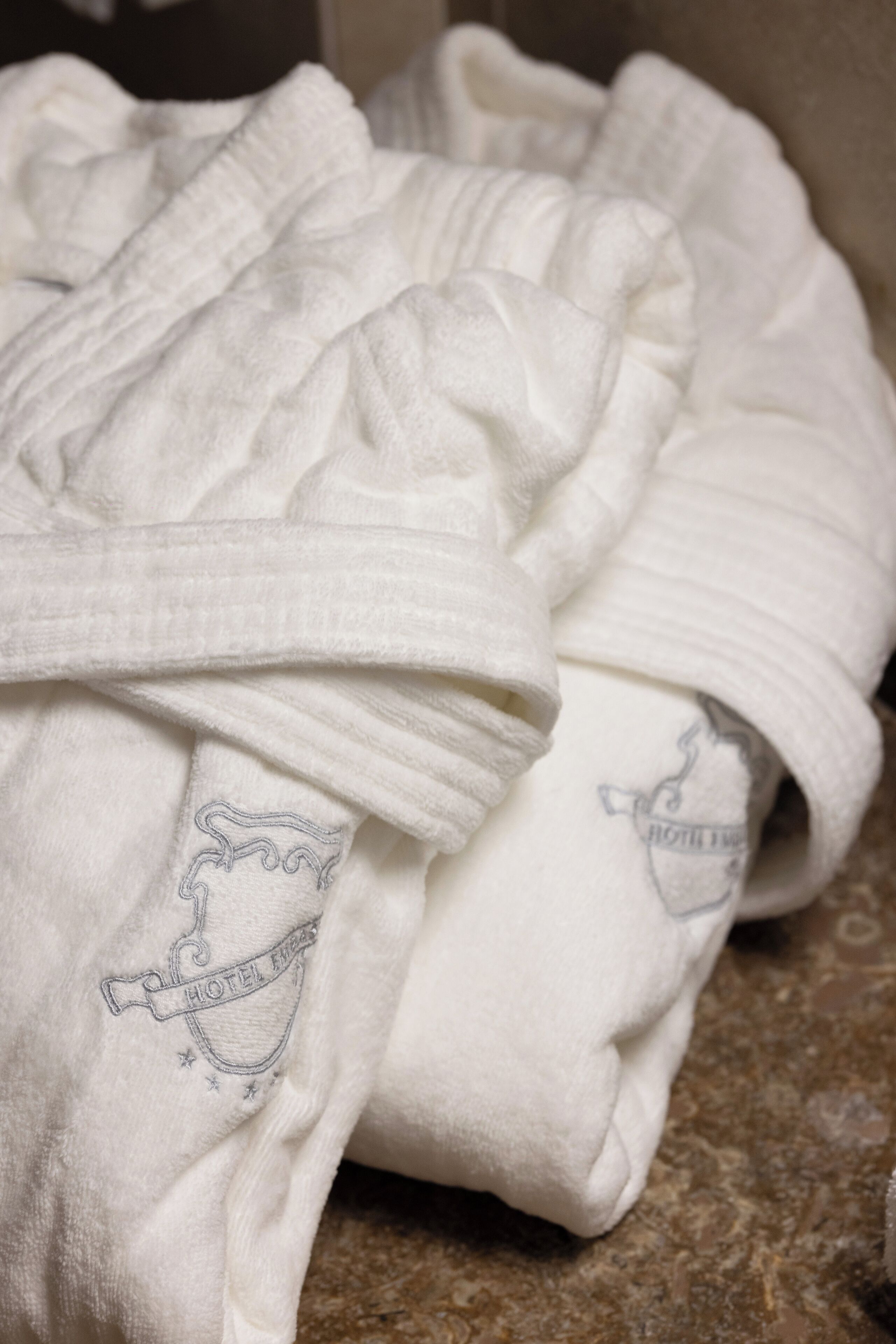 deluxe room | bathroom | slippers, bidet, towels