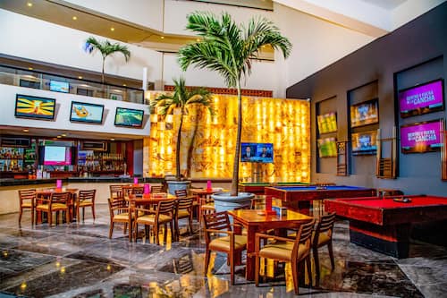 8 bars/lounges, swim-up bar, beach bar