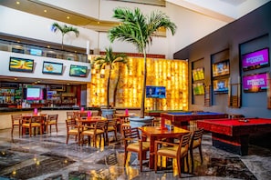8 bars/lounges, swim-up bar, beach bar
