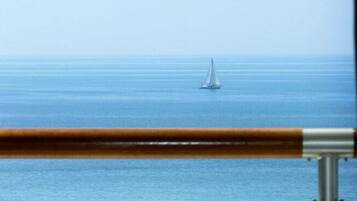 A sailboat on calm waters.