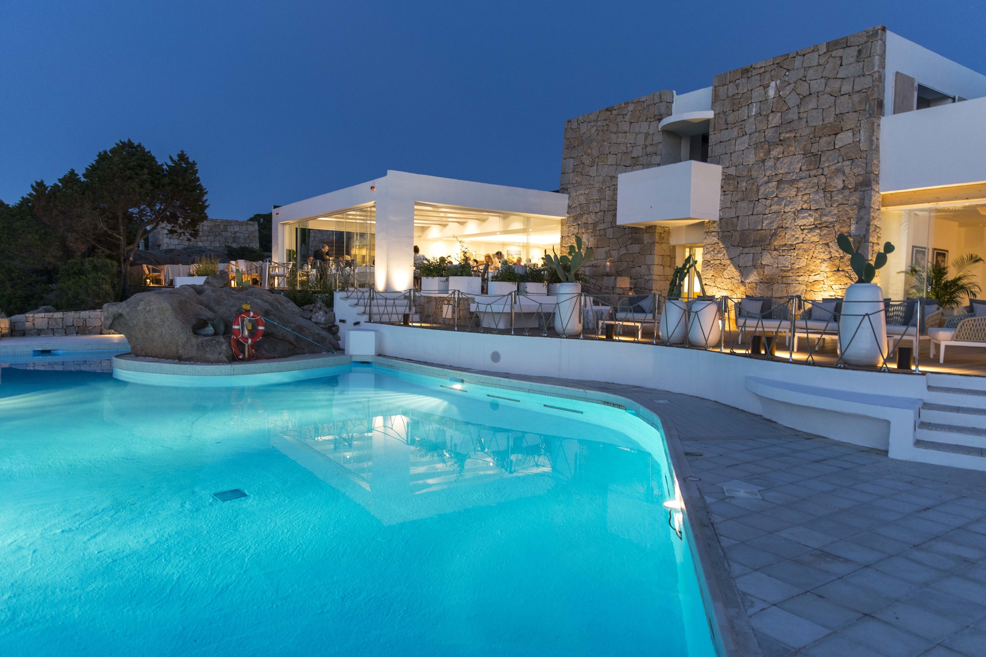 outdoor pool, pool umbrellas, pool loungers