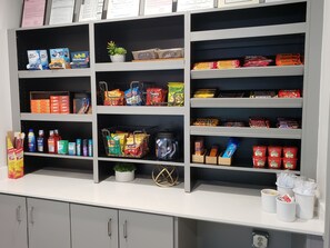 A well-organized pantry with various food items and snacks. - Comfort Suites Valdosta Mall Area (Valdosta)