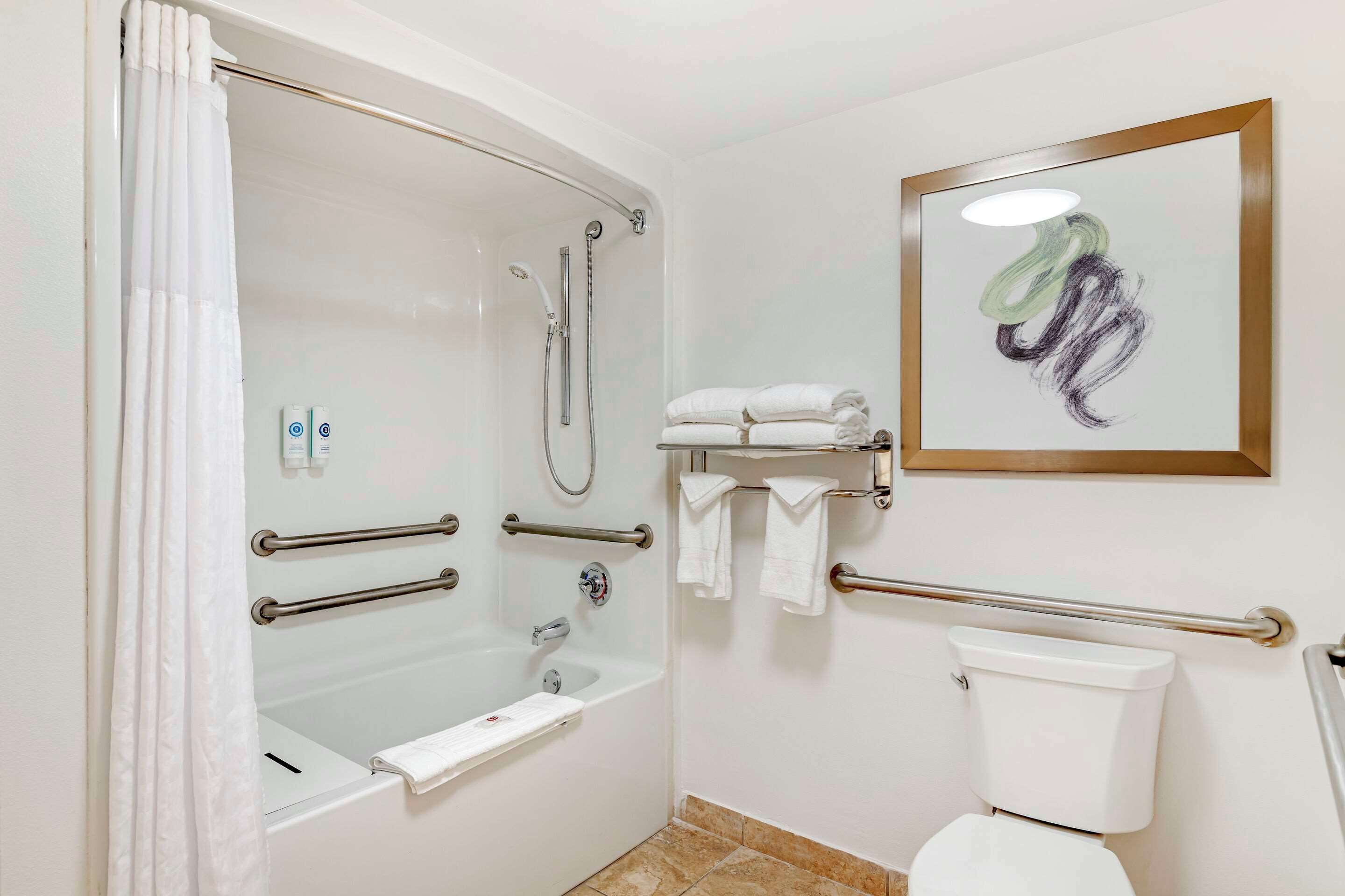 premium bedding, desk, laptop workspace, blackout curtains