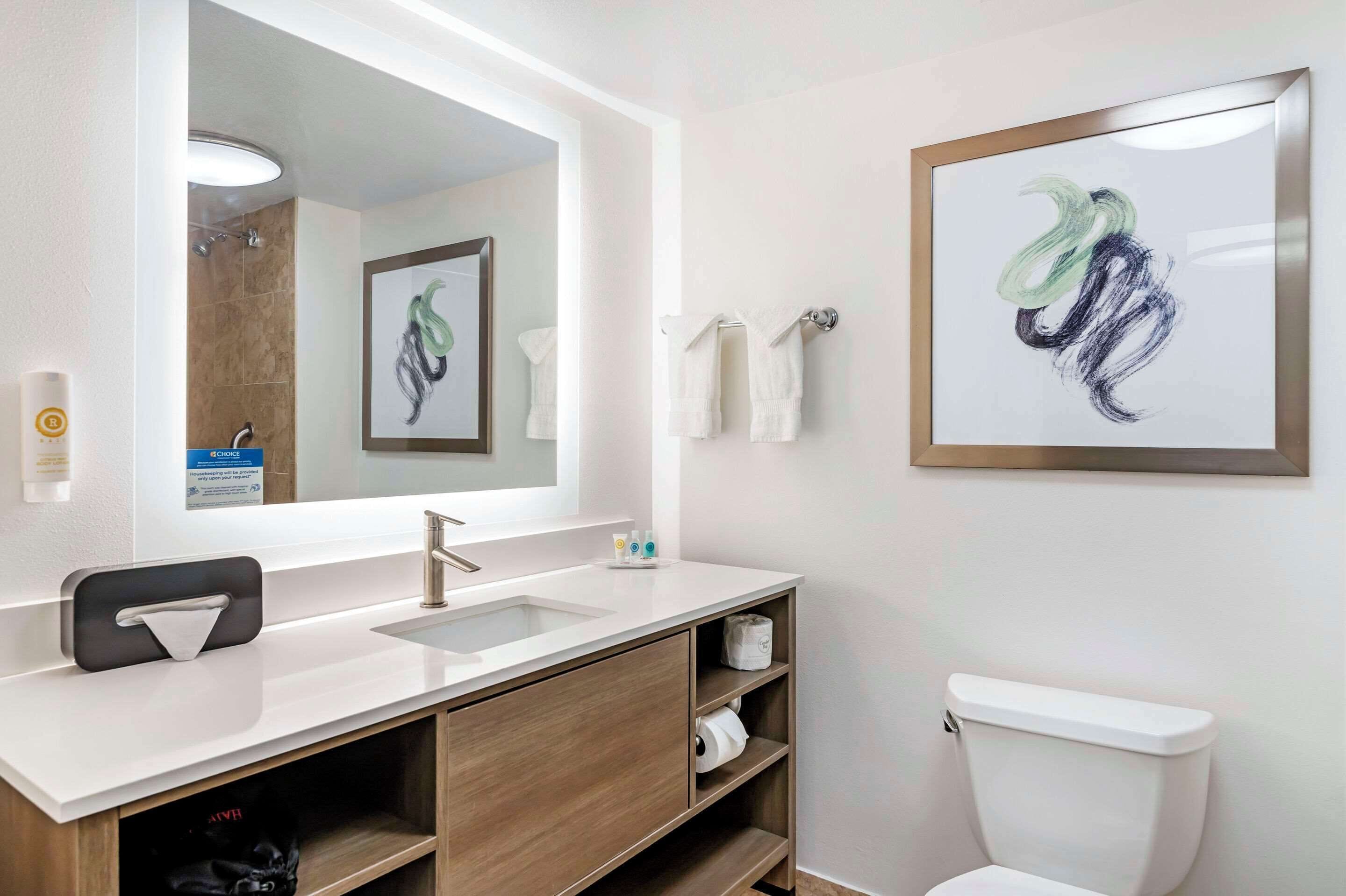 premium bedding, desk, laptop workspace, blackout curtains