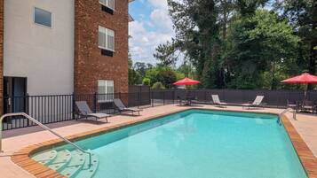 Outdoor pool, open 9:00 AM to 9:00 PM, sun loungers