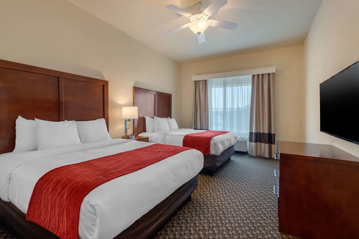 Suite, 2 Queen Beds, Non Smoking | Desk, laptop workspace, iron/ironing board, cribs (free)