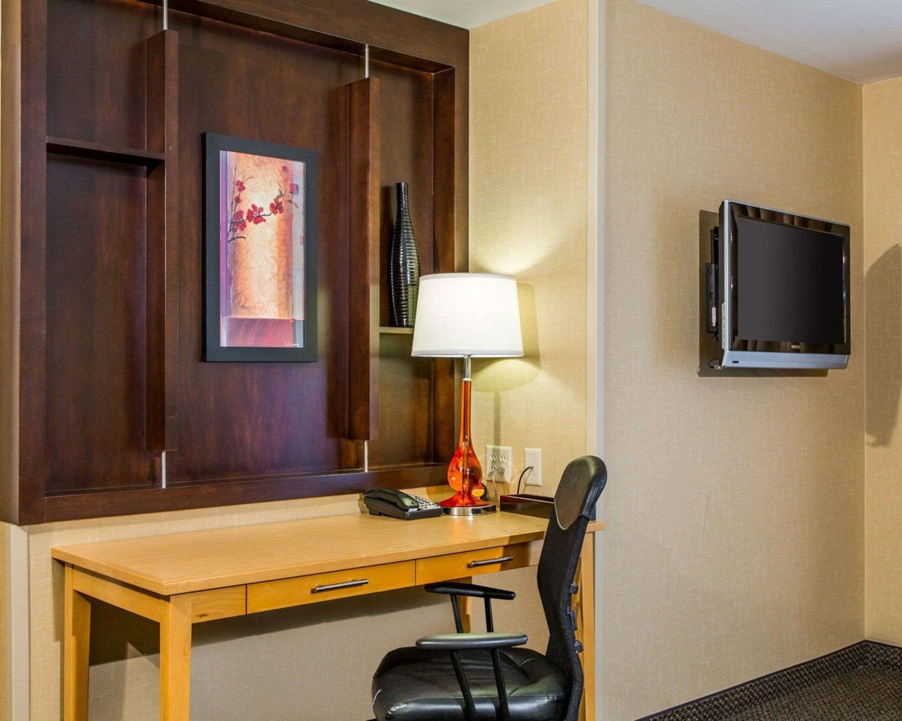 premium bedding, down duvets, desk, blackout curtains