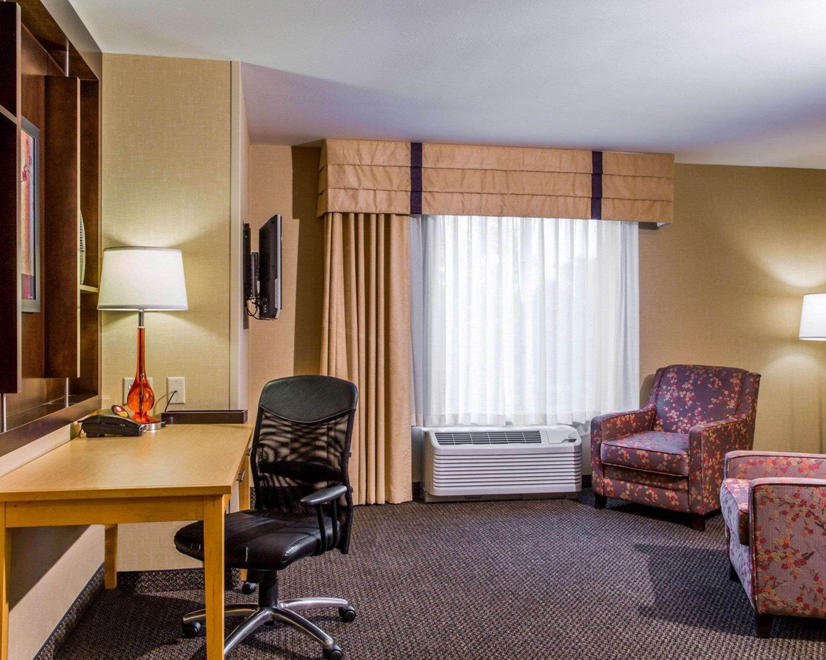 premium bedding, down duvets, desk, blackout curtains