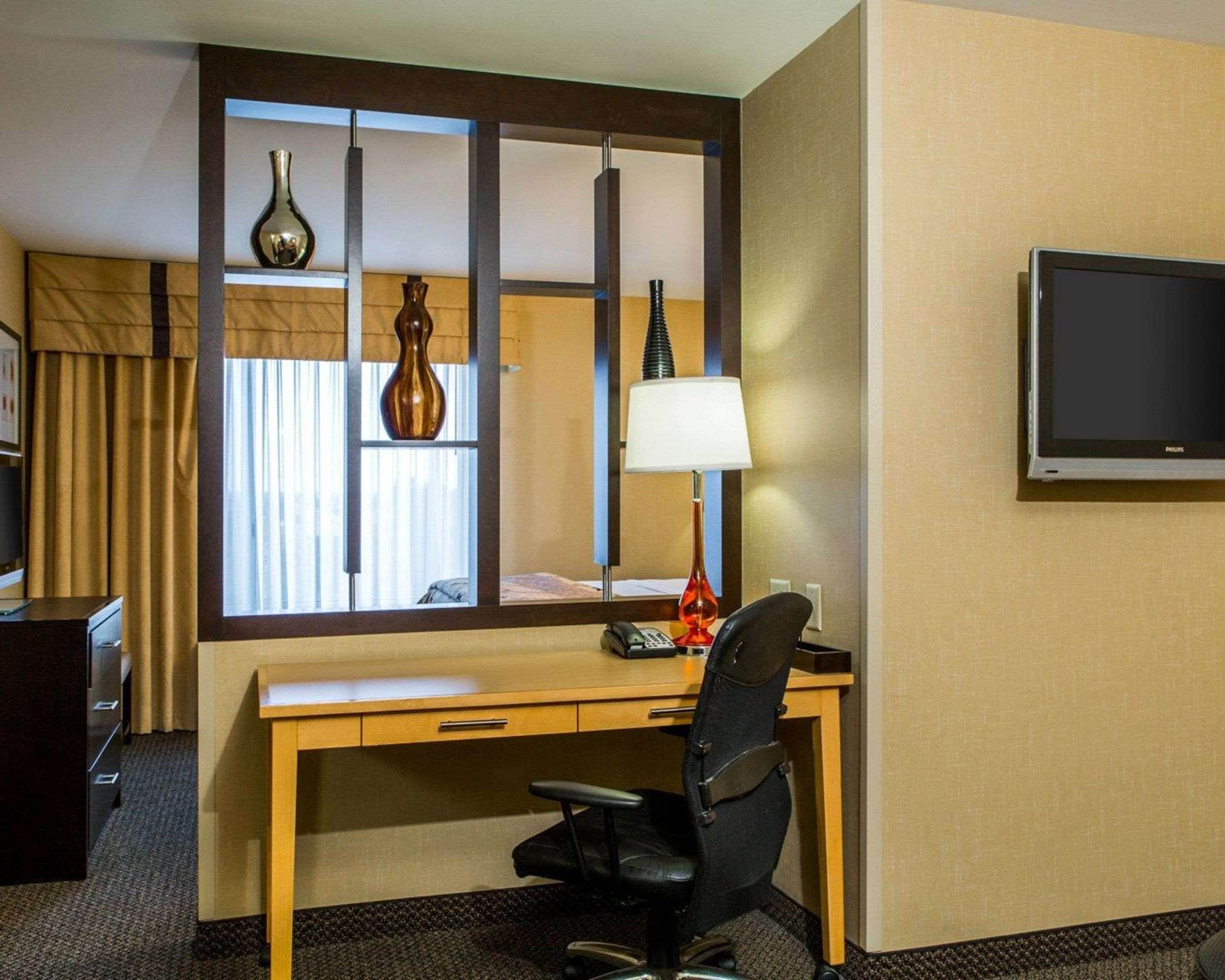 premium bedding, down duvets, desk, blackout curtains