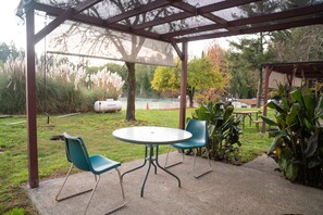 Suite, 1 Queen Bed with Sofa bed, Kitchenette | Terrace/patio