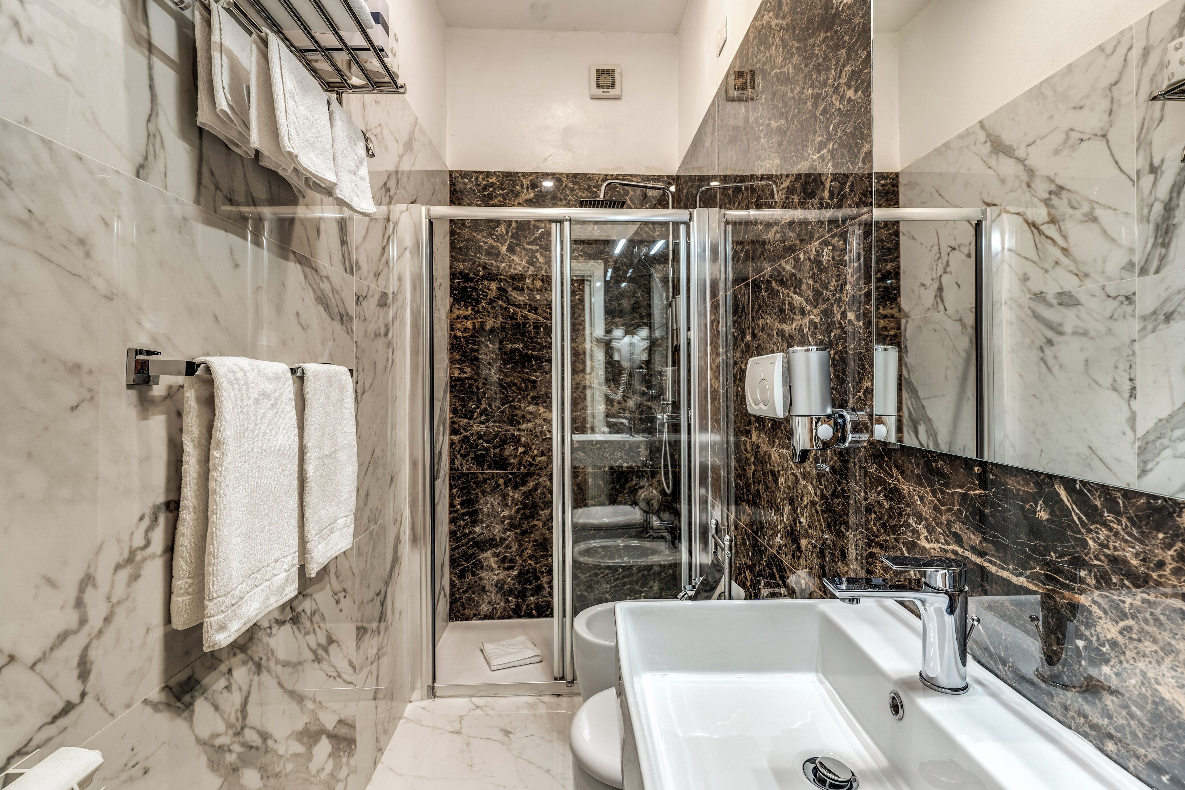 family room | bathroom | shower, rainfall showerhead, free toiletries, hair dryer