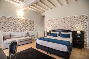 Deluxe dubbelrum eller tvåbäddsrum | Sängtillbehör av högsta kvalitet och minibar