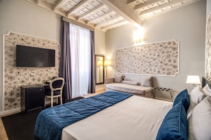 Habitación Deluxe con 1 cama doble o 2 individuales | Ropa de cama de alta calidad, minibar, caja fuerte