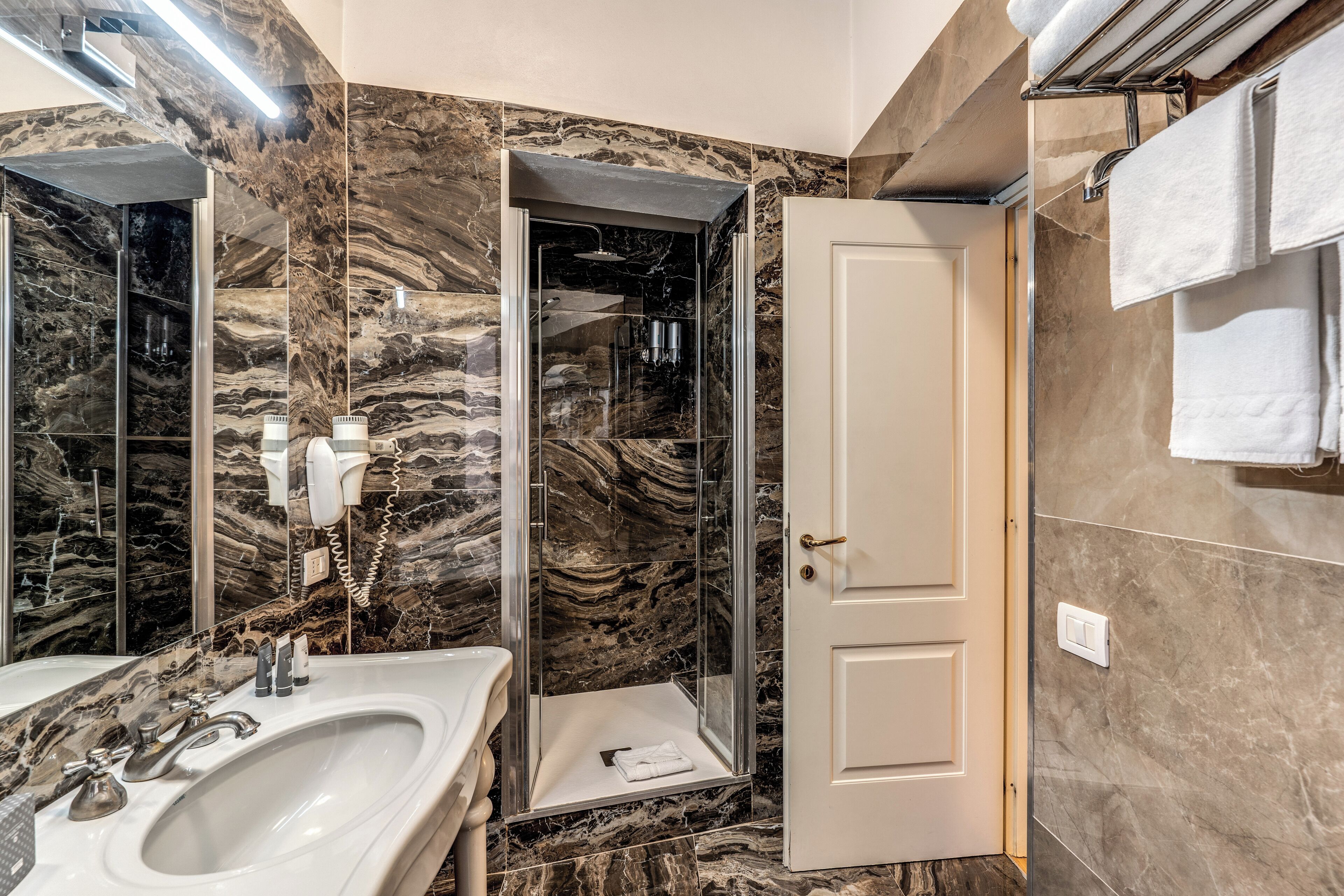 basic double room | bathroom | shower, rainfall showerhead, free toiletries, hair dryer