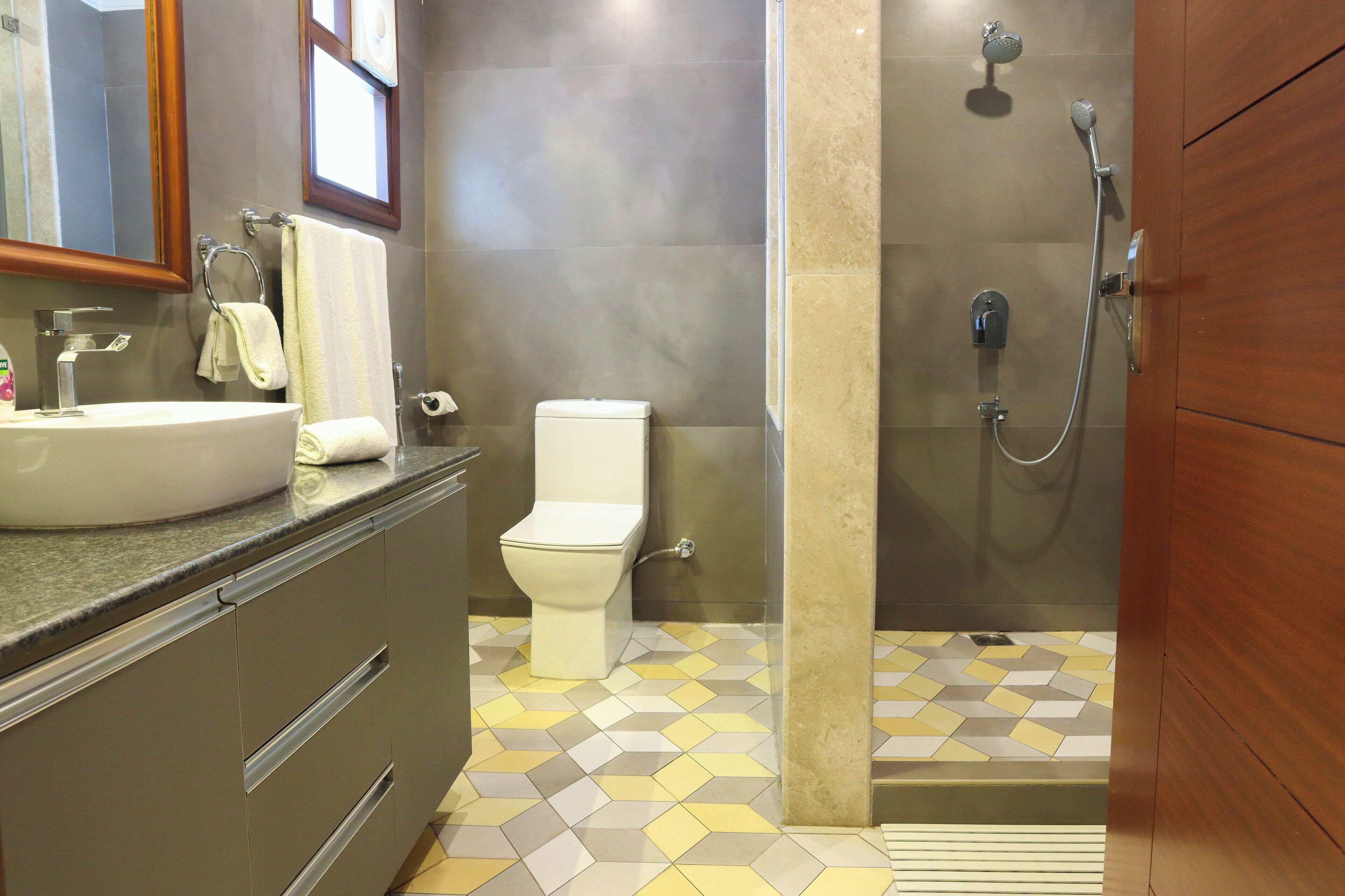 shower, rainfall showerhead, designer toiletries, hair dryer