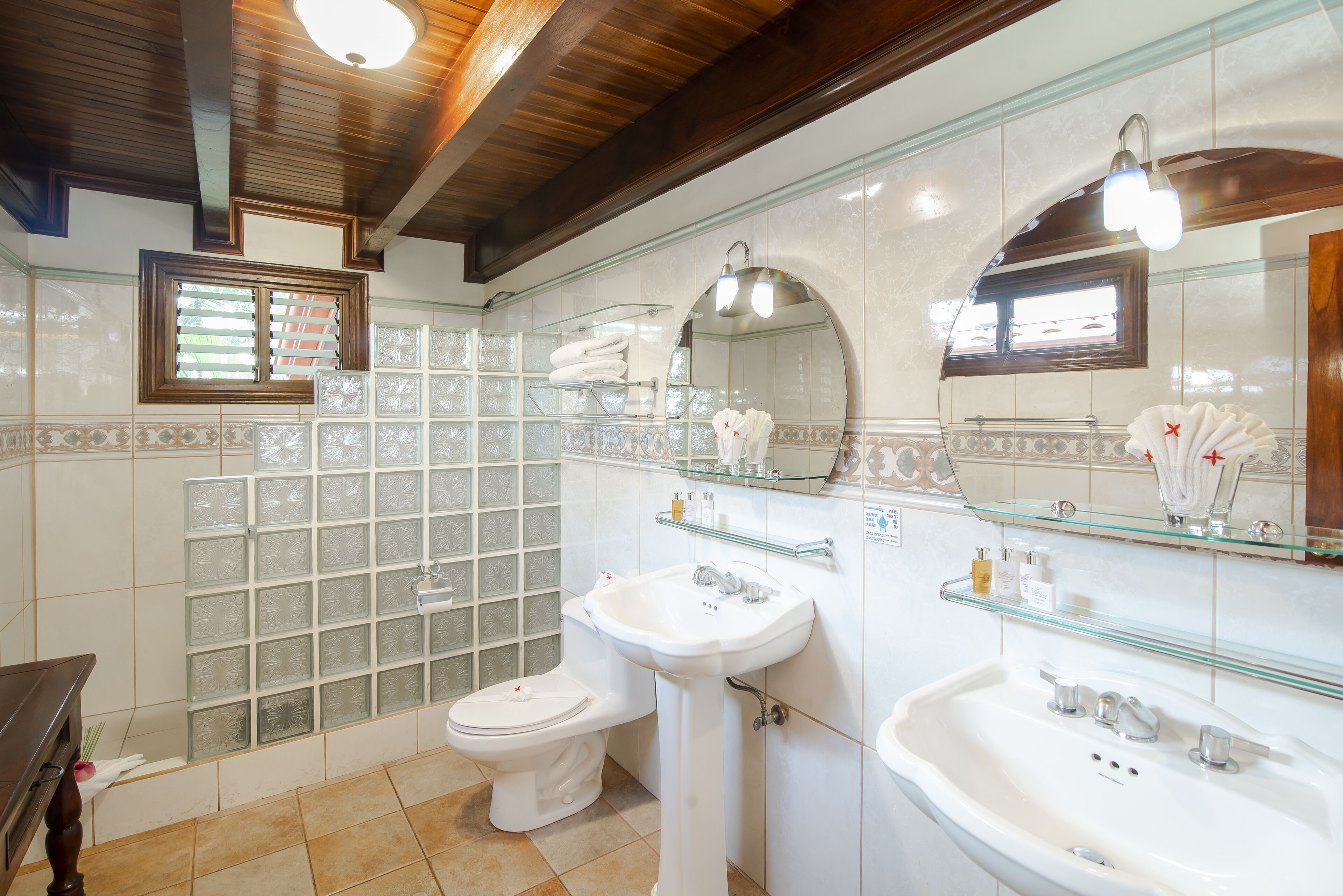 suite | bathroom | shower, rainfall showerhead, hair dryer, towels