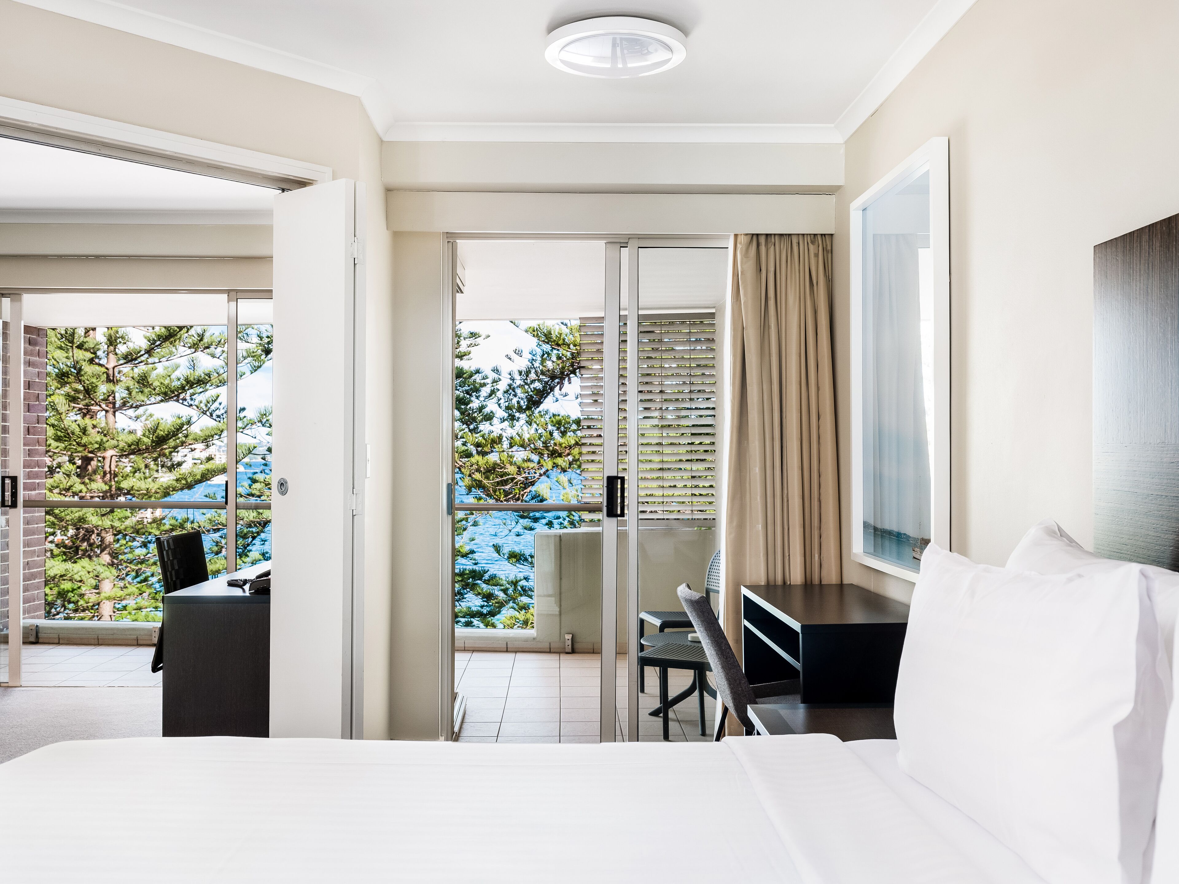 Deluxe Apartment, 1 Bedroom, Harbor View | Living area | 0-inch LED TV with cable channels, TV, DVD player