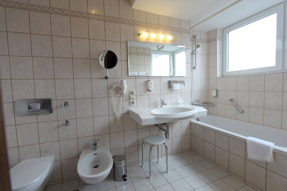 free toiletries, hair dryer, slippers, towels