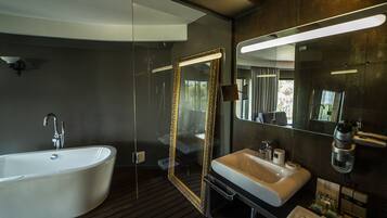 Medium Suite (Free Safe, Free Fitness & Sauna) | Bathroom | Shower, designer toiletries, hair dryer, bathrobes