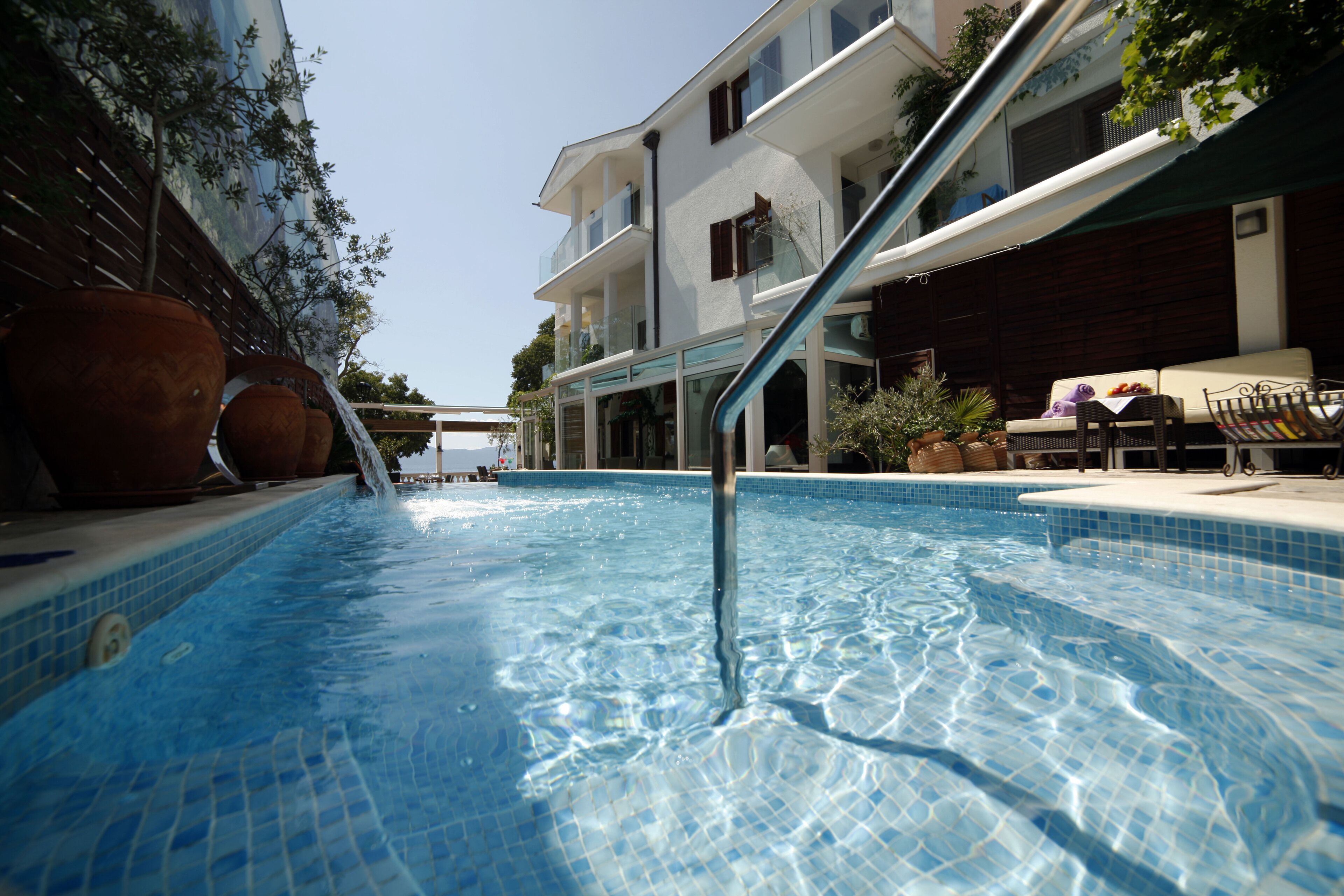 outdoor pool, pool umbrellas