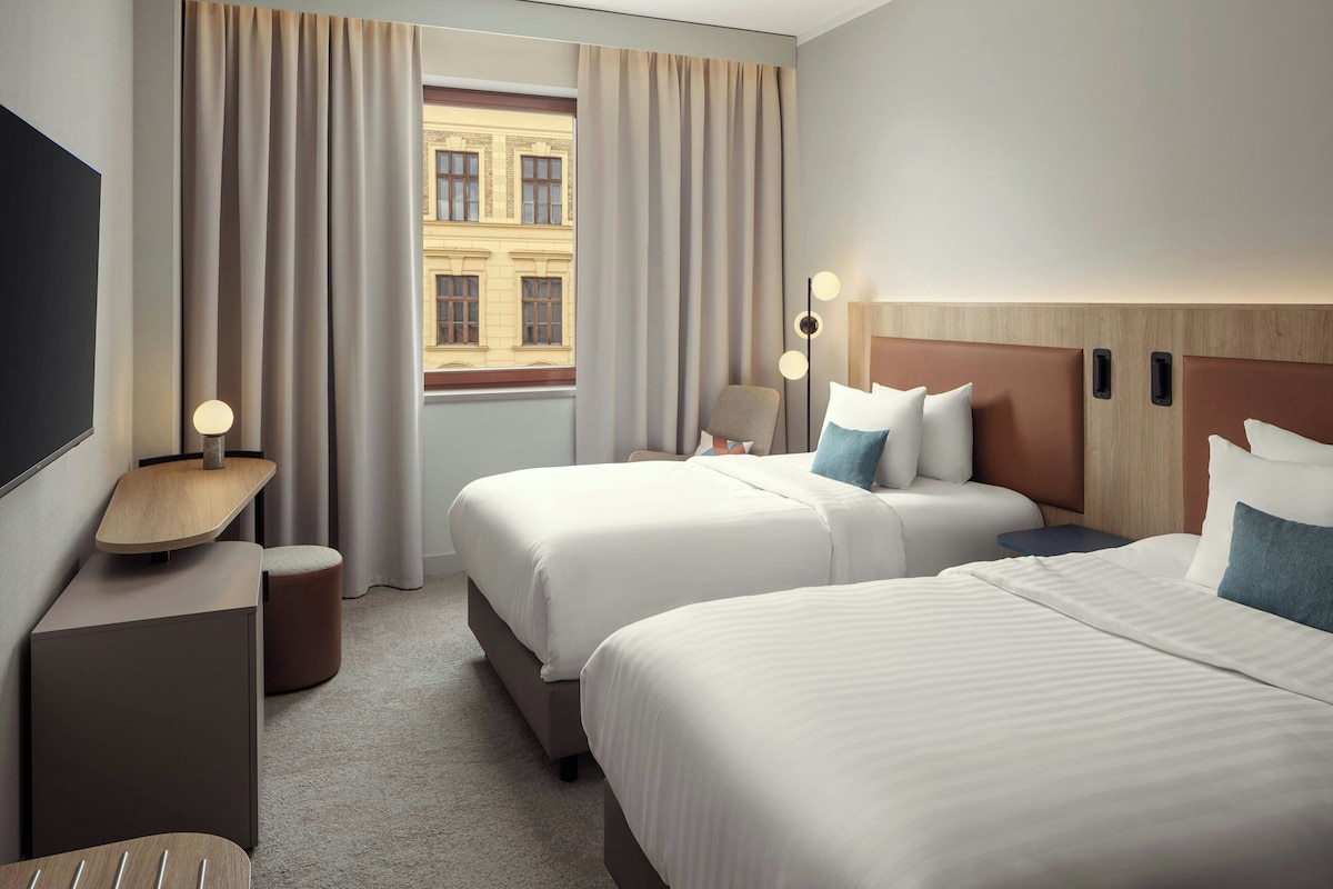 Room, 2 Double Beds | In-room safe, desk, laptop workspace, blackout drapes