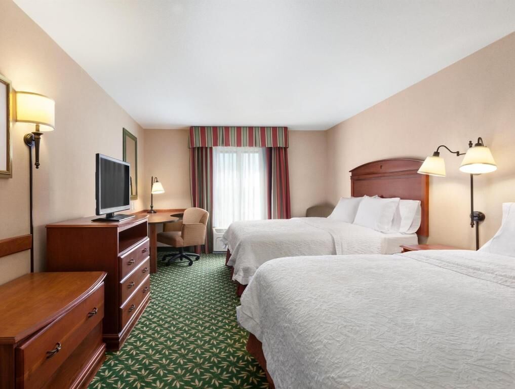 Premium bedding, desk, blackout drapes, iron/ironing board