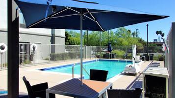 Outdoor pool, open 8:00 AM to 10:00 PM, pool umbrellas, pool loungers